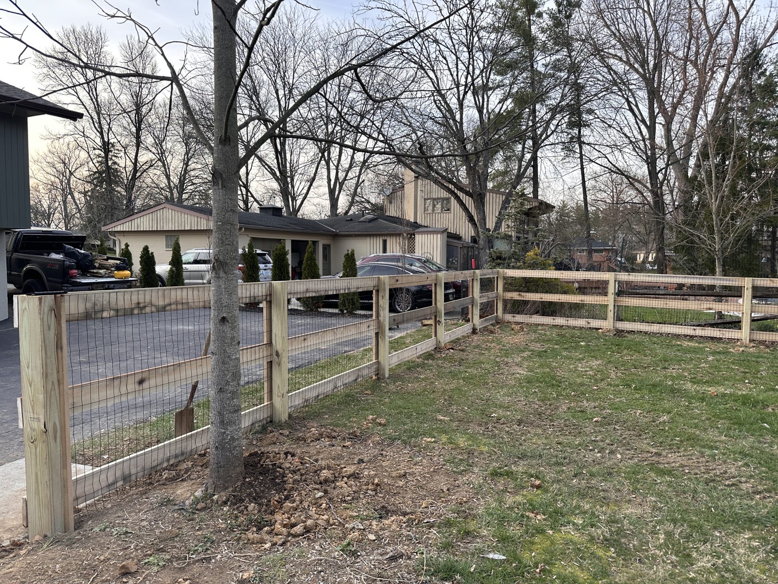 Split rail fence corner and gate at a Cincinnati property