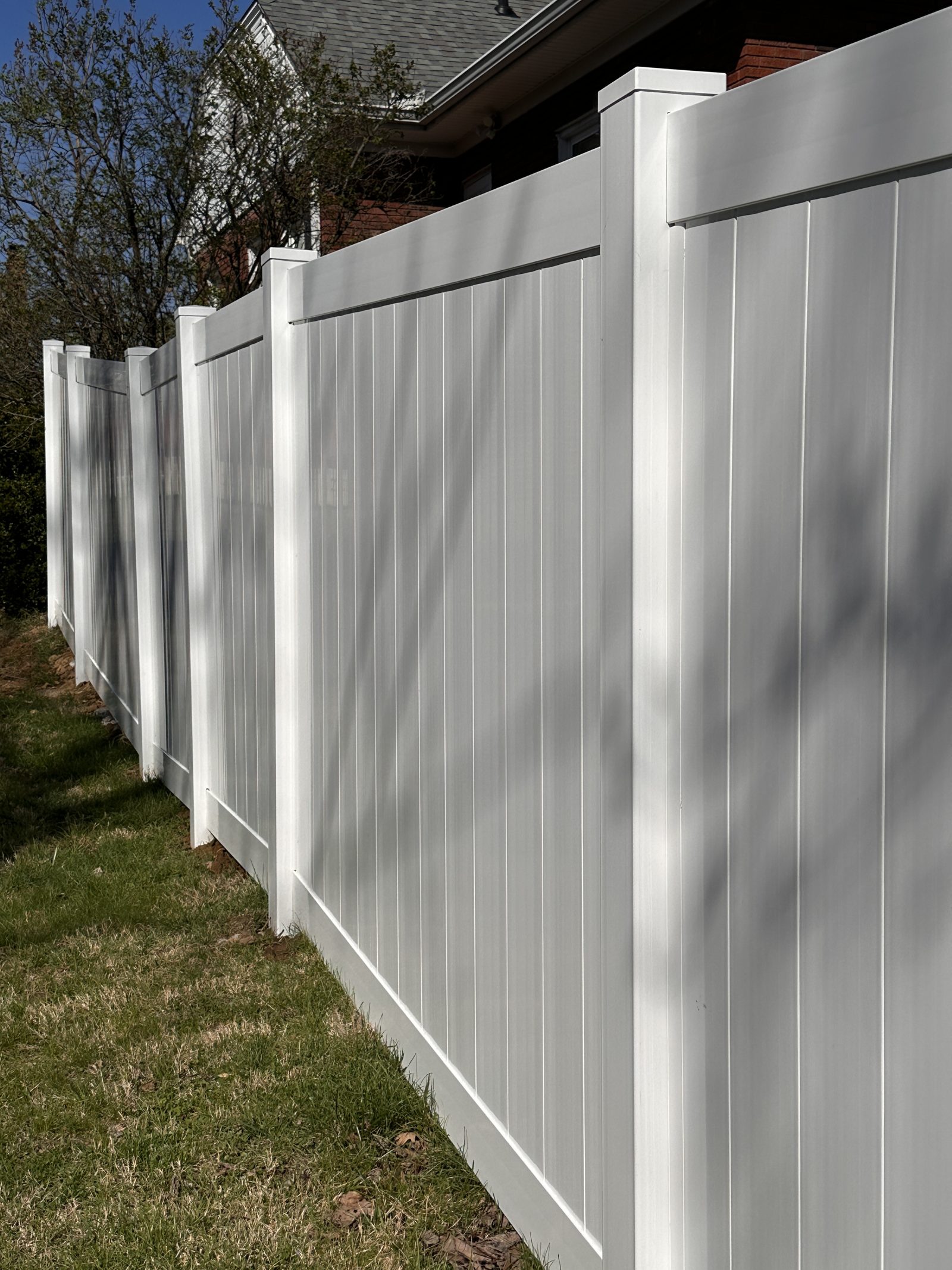 White vinyl privacy fence panel detail