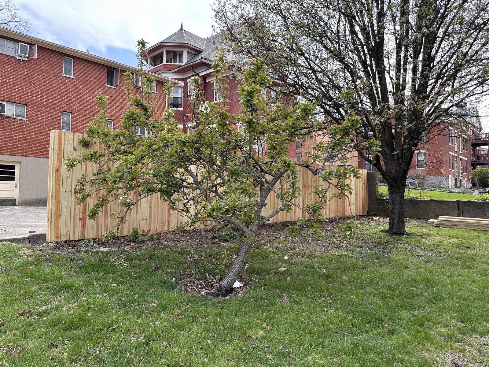 Wood privacy fence behind a Cincinnati patio