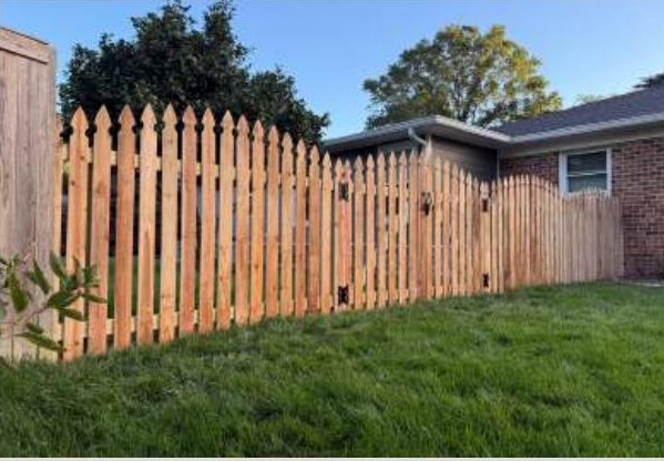 Arch and Scallop Cut Picket installed by Heartwood Fence