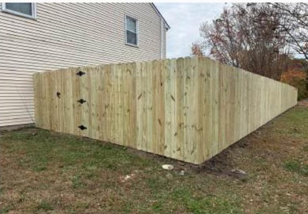 Dog Ear Picket Privacy, 5/8" Treated Pine installed by Heartwood Fence